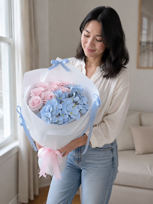 Blue Hydrangea Blush Rose Bouquet, person-held angled view; AI design illustration
