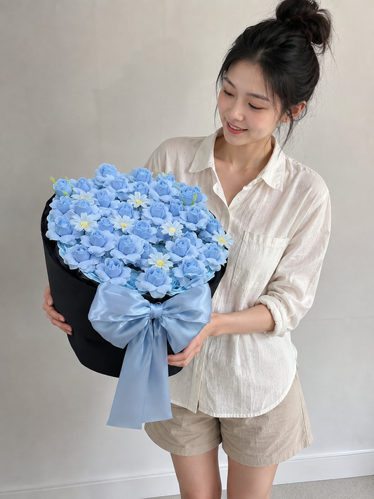 Blue Hydrangea Grand Satin Bouquet, person-held angled view; AI design illustration