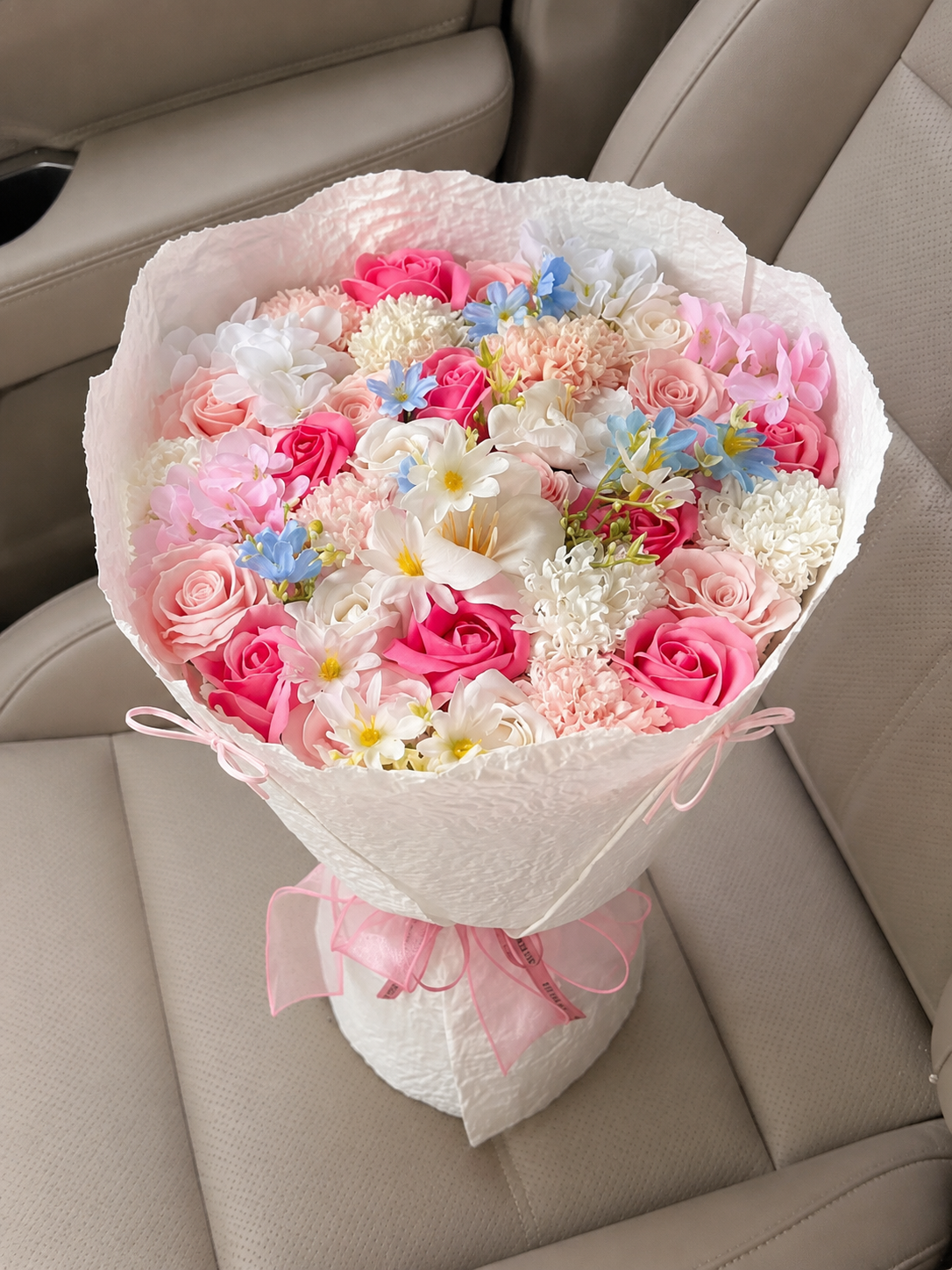 Pink Daisy Rose Festival Bouquet, high-angle car view; AI design illustration