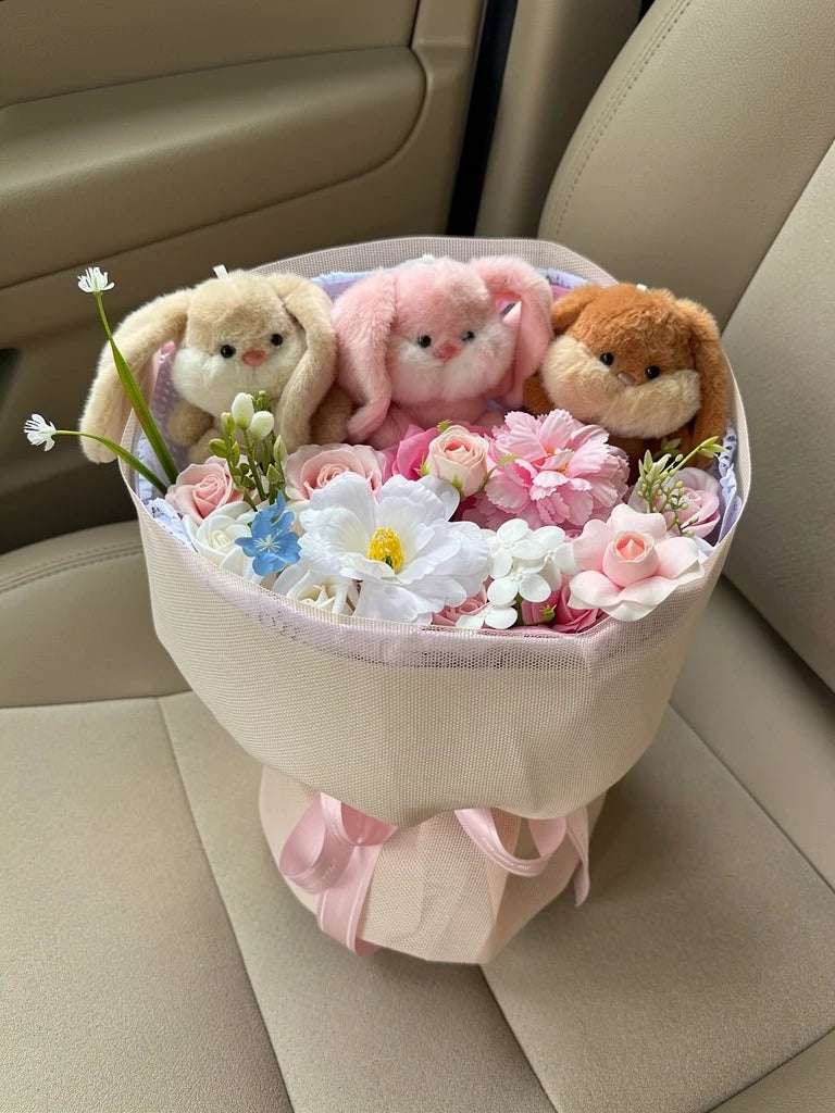 Trio Plush Floral Keepsake Bouquet, Medium, high-angle car-seat view; AI lifestyle illustration