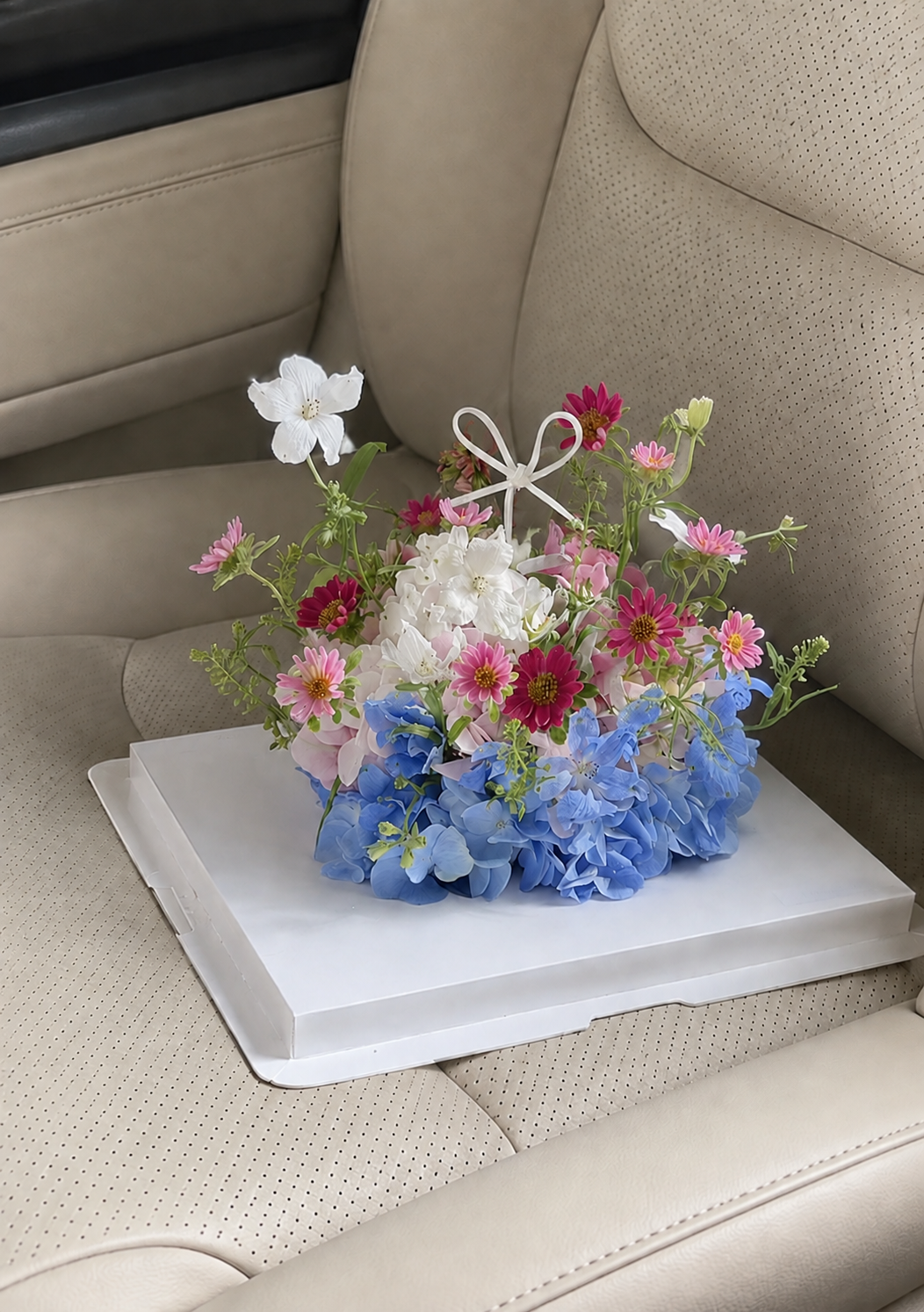 Blue Meadow Flower Cake, car top view; AI design illustration