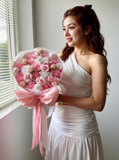 Nguyen Lan reference model holding Blush Satin Rose Garden Bouquet at an angle; AI lifestyle illustration