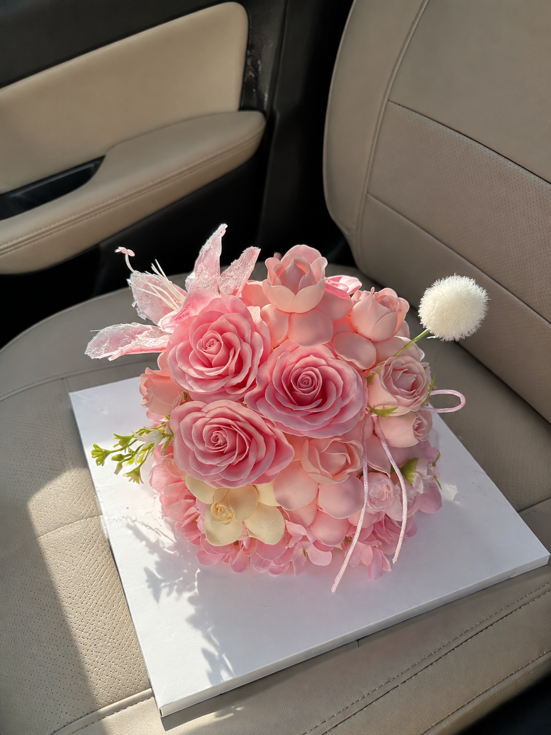 Coral Rose Celebration Flower Cake, high-angle car view; AI design illustration
