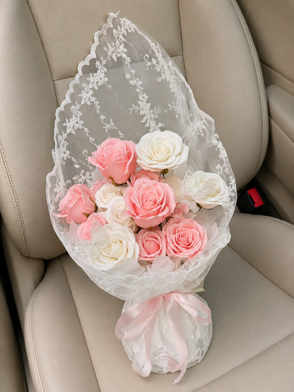 Coral Ivory Rose Lace Bouquet – high-angle bouquet on parked car seat