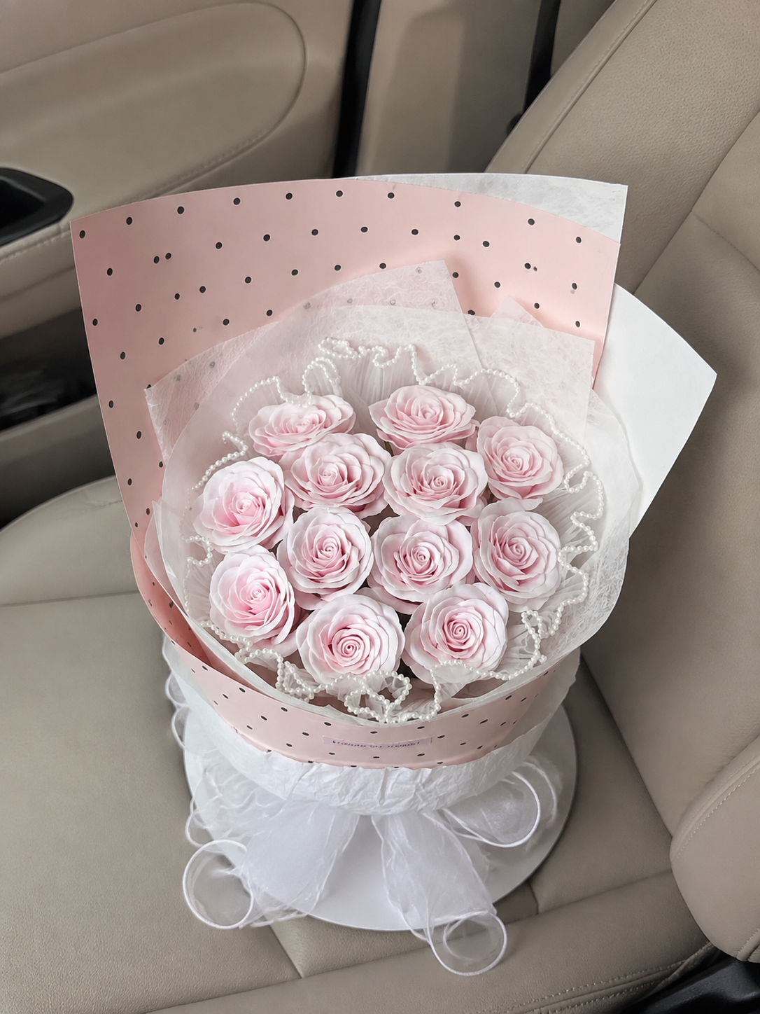 Pastel Rose Polka Dot Bouquet – Blush Pink – AI-assisted high-angle parked car view