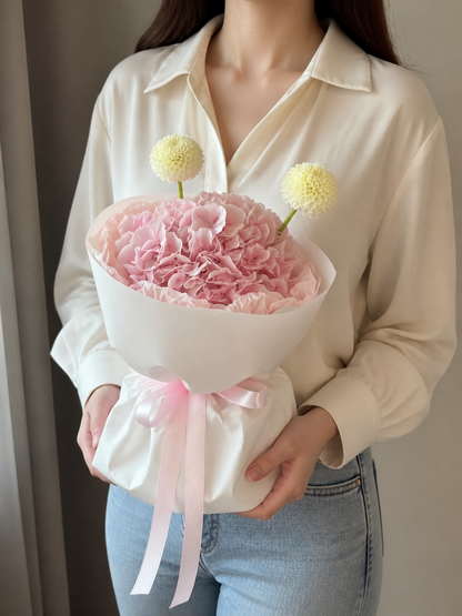 Petite Hydrangea Cloud Mini Bouquet – Blush Pink Small – AI-assisted model-held angled view