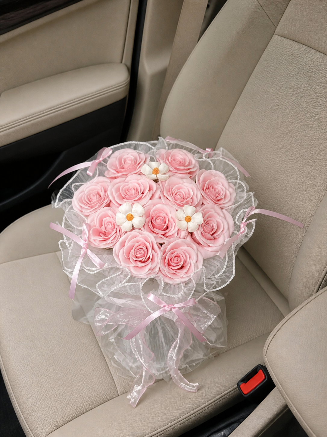 Petite Pink Rose Daisy Pearl Bouquet — overhead car-seat view; AI-assisted design illustration