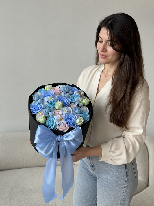 Rose Daisy Signature Bouquet – Sky Blue – AI-assisted model-held angled view