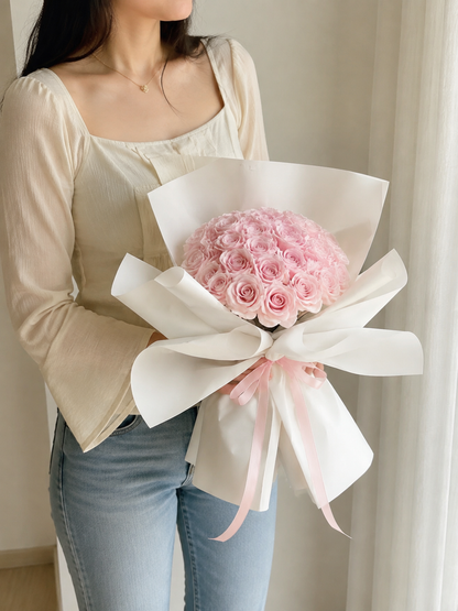 Soft Rose Ribbon Bouquet – Blush Pink – AI-assisted model-held angled view