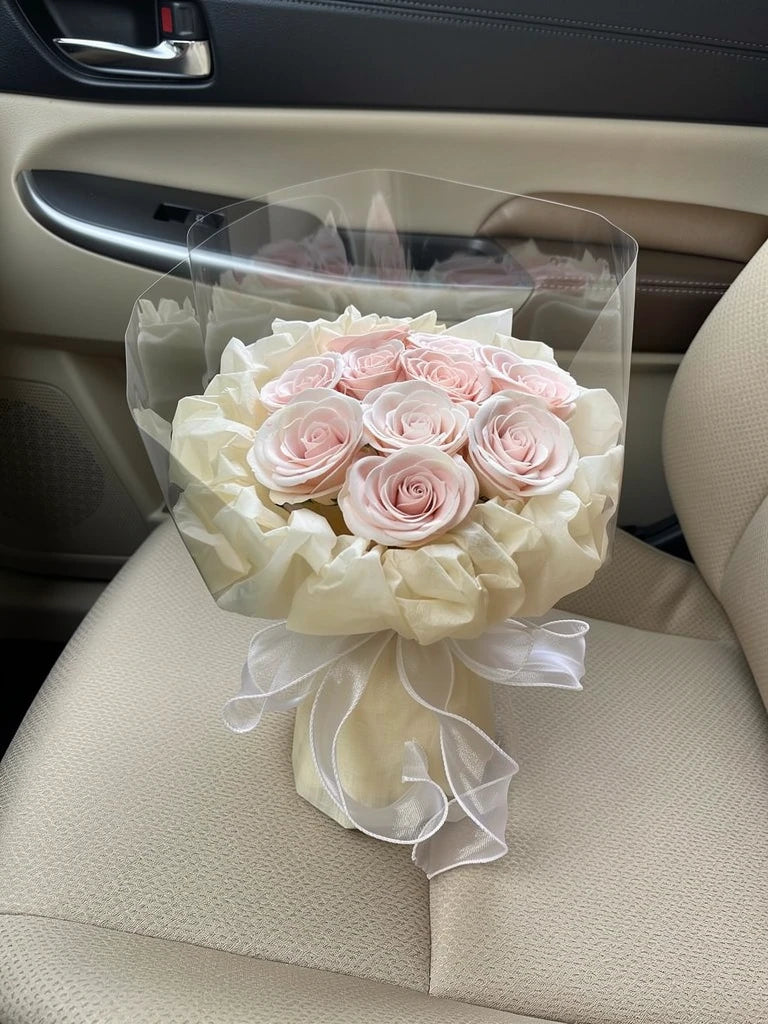 Ivory Champagne Rose Small Bouquet, Small, high-angle car-seat view; AI lifestyle illustration
