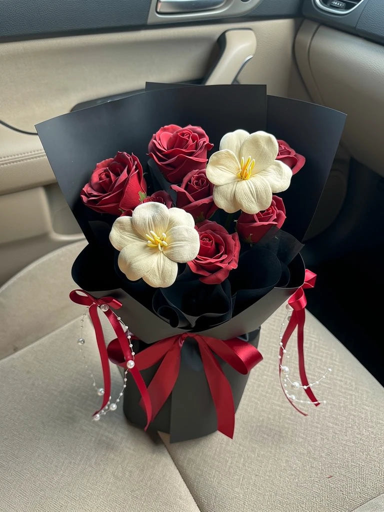 Midnight Red Rose Small Bouquet, Small, high-angle car-seat view; AI lifestyle illustration
