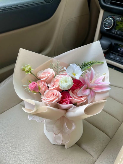 Petite Pink Lily Rose Bouquet, Medium, high-angle car-seat view; AI lifestyle illustration
