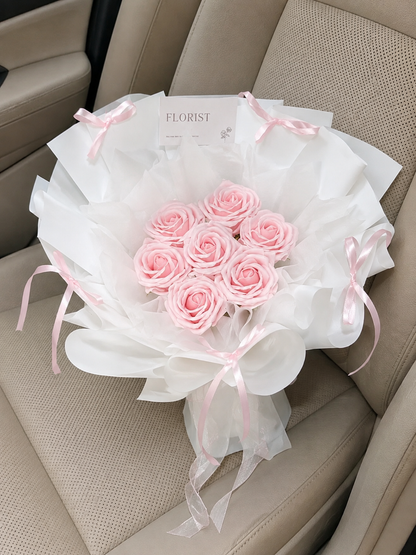 Petite Pink Rose Envelope Bouquet — car view; AI-assisted design illustration