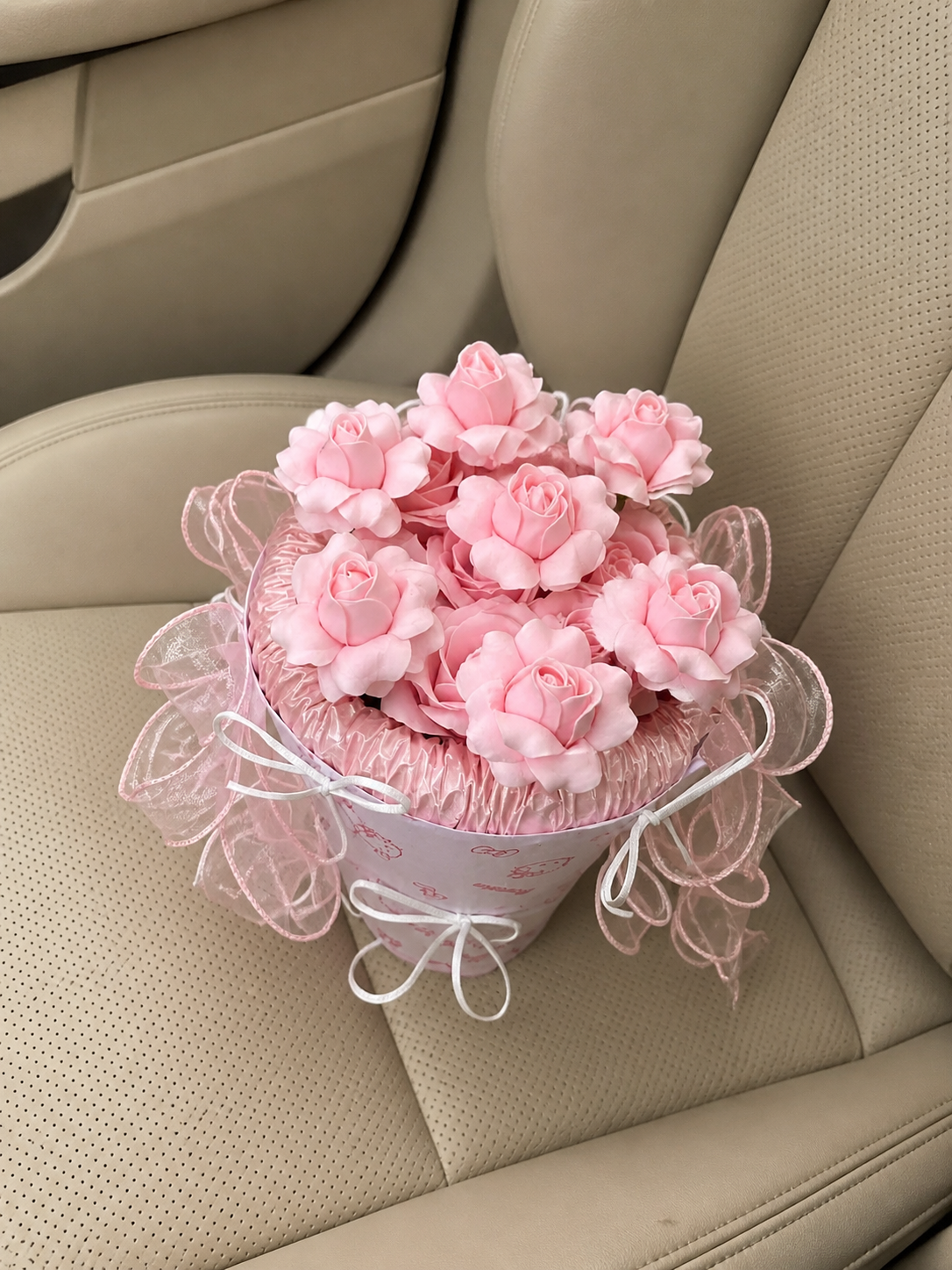 Pink Blossom Tulle Posy Bouquet — car view; AI-assisted design illustration