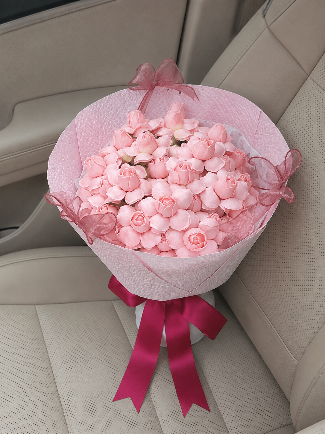 Pink Butterfly Tulip Rose Bouquet, high-angle car view; AI design illustration
