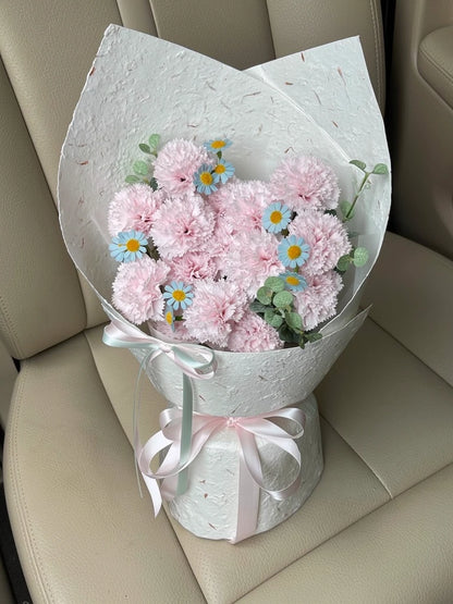 Pink Carnation Daisy Bouquet, Medium, high-angle car-seat view; AI lifestyle illustration
