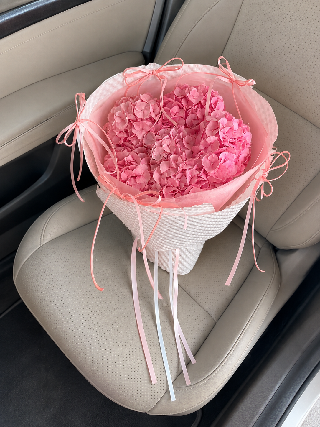 Pink Hydrangea Rose Ring Bouquet, high-angle car view; AI design illustration