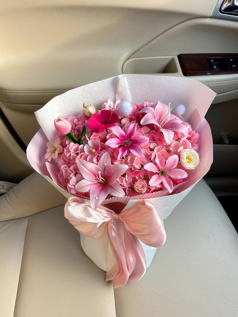 Pink Lily Hydrangea Bouquet, Medium, high-angle car-seat view; AI lifestyle illustration
