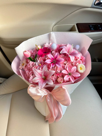 Pink Lily Hydrangea Bouquet, Medium, high-angle car-seat view; AI lifestyle illustration