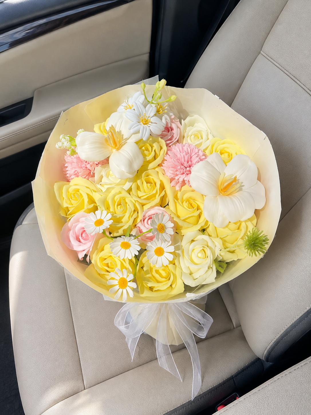 Sunshine Yellow Mixed Flower Bouquet, car-seat top view; AI design illustration